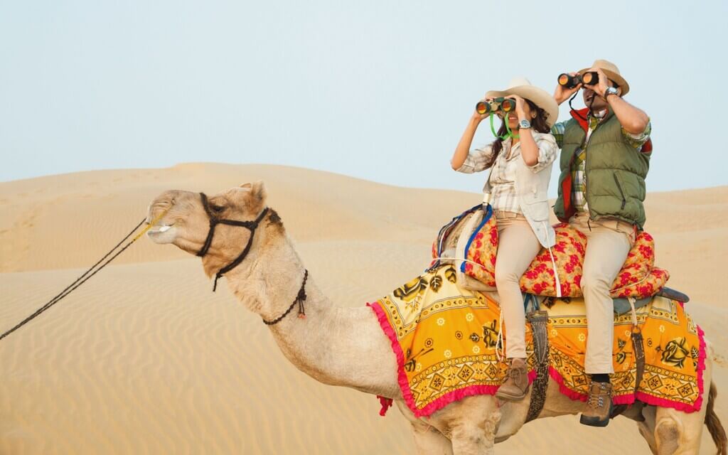 Camel Riding Within The Desert: dubai tourist attractions